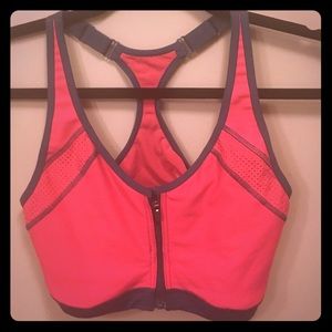 Pink and grey zip up sports bra